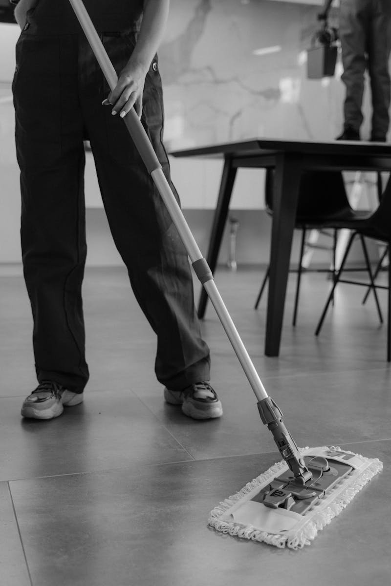 Commercial floor being mopped in a modern office